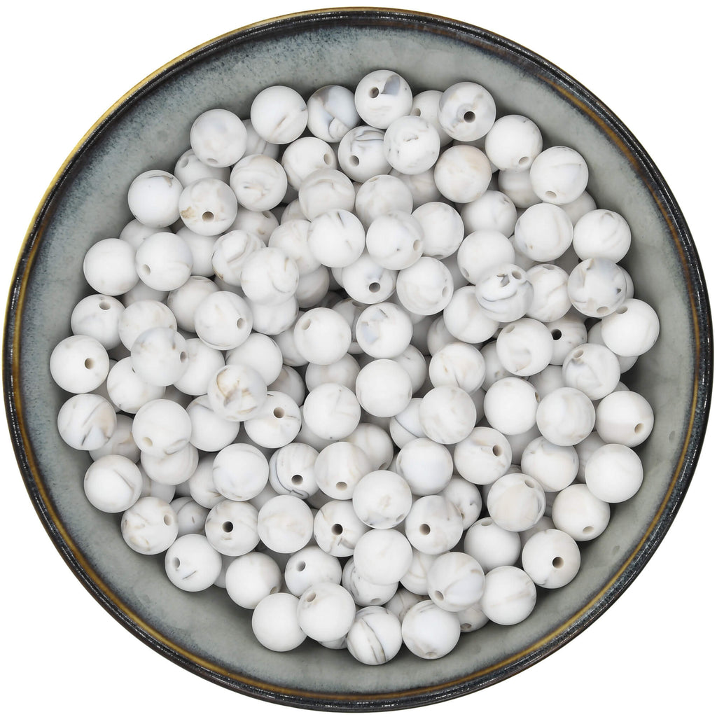 Ronde siliconen kraal van 12 mm in wit met een marmering in de kleur taupe