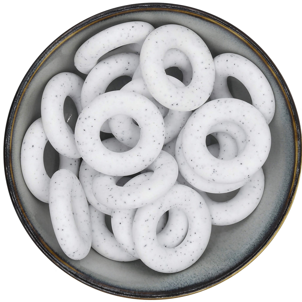 Siliconen kraal kleine ring in wit met zwarte spikkels