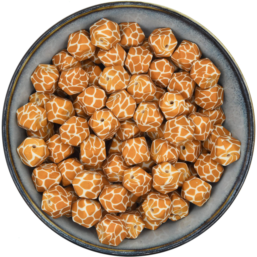 Siliconen kraal mini-hexagon 14 mm met een girafprint