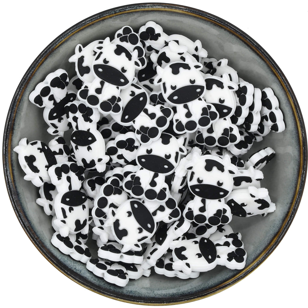 Siliconen figuurkraal in de vorm van een schattige zittende koe.