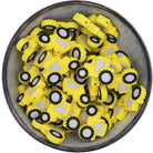 Siliconen figuurkraal in de vorm van een gele traktor