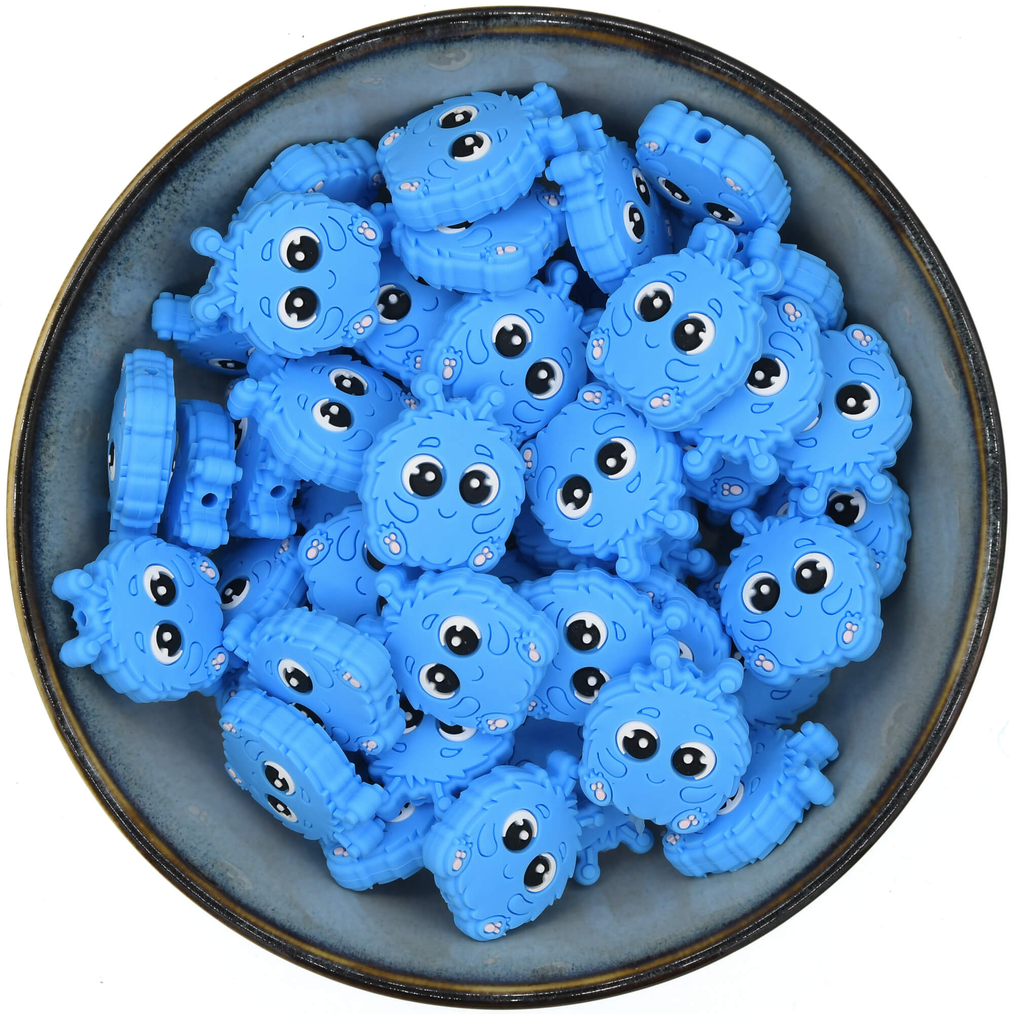 Siliconen figuurkraal in de vorm van een blauw pluizig monstertje